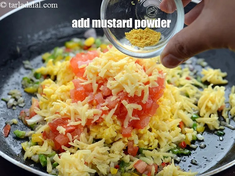 Step 12 – Add 1/4 tsp&nbsp;<a href="https://www.tarladalal.com/glossary-mustard-powder-rai-powder-sarson-powder-powdered-sarson-526i">mustard (rai / sarson) powder</a>.
