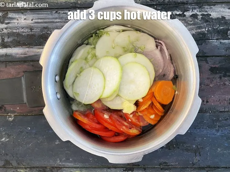 Step 12 – Add&nbsp;3 cups of hot water.