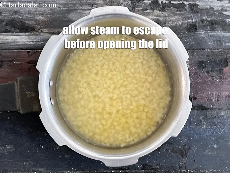 Step 12 – Allow the steam to escape before opening the lid.