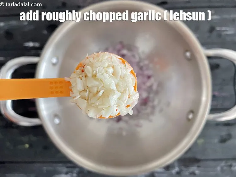 Step 13 – Add&nbsp;<meta charset="UTF-8" />3&nbsp;<a href="glossary-chopped-garlic-790i">cloves of garlic (lehsun), roughly chopped</a>. This is 1 tsp off roughly …
