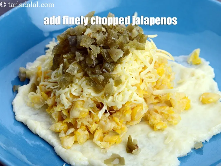 Step 12 – Add&nbsp;1 1/2 tbsp&nbsp;finely&nbsp;<a href="https://www.tarladalal.com/glossary-chopped-jalapenos-1242i">chopped jalapenos</a>.