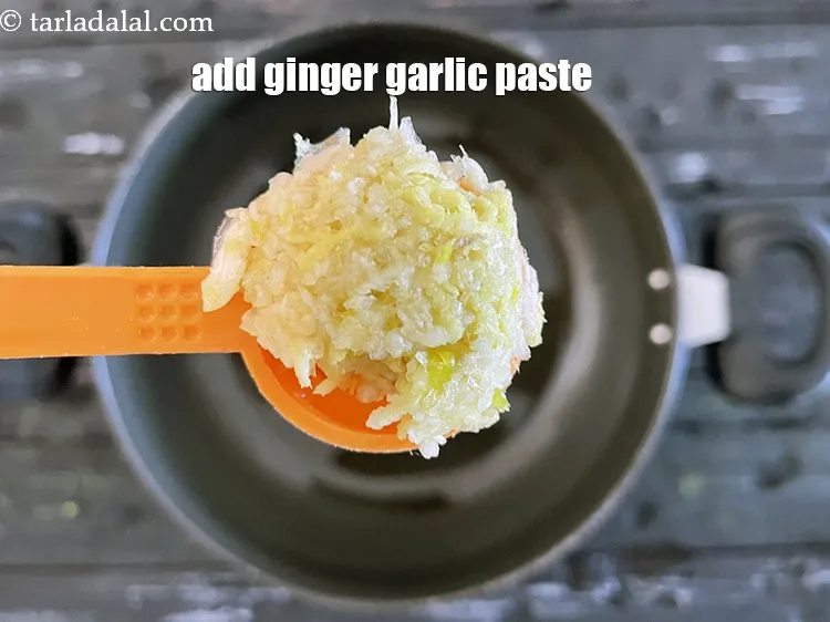 Step 12 – Add&nbsp;<meta charset="UTF-8" />2 tsp&nbsp;<a href="glossary-ginger-garlic-paste-adrak-lehsun-ki-pate-adrak-lahsun-ki-paste-939i">ginger-garlic (adrak-lehsun) paste</a>.