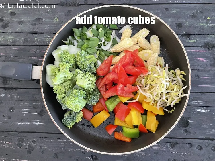 Step 14 – Add<strong> 1/2 cup&nbsp;<a href="glossary-sliced-tomatoes-746i">tomato, deseeded and sliced</a>.</strong>