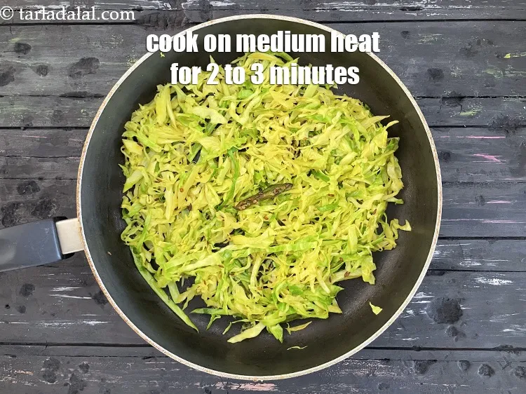 Step 12 – <meta charset="UTF-8" /> &nbsp;Cook on a medium flame for<strong> </strong>2&nbsp;to 3&nbsp;minutes, while stirring occasionally.