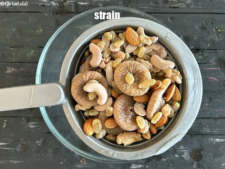 Step 12 – Strain them using a strainer and discard the water. You can peel the pistachios lightly …