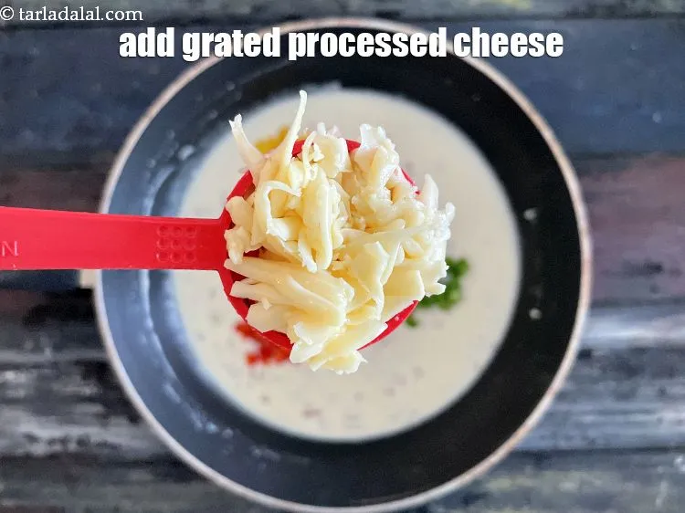 Step 19 – Add&nbsp;2 tbsp&nbsp;<a href="glossary-grated-processed-cheese-868i">grated processed cheese</a>.
