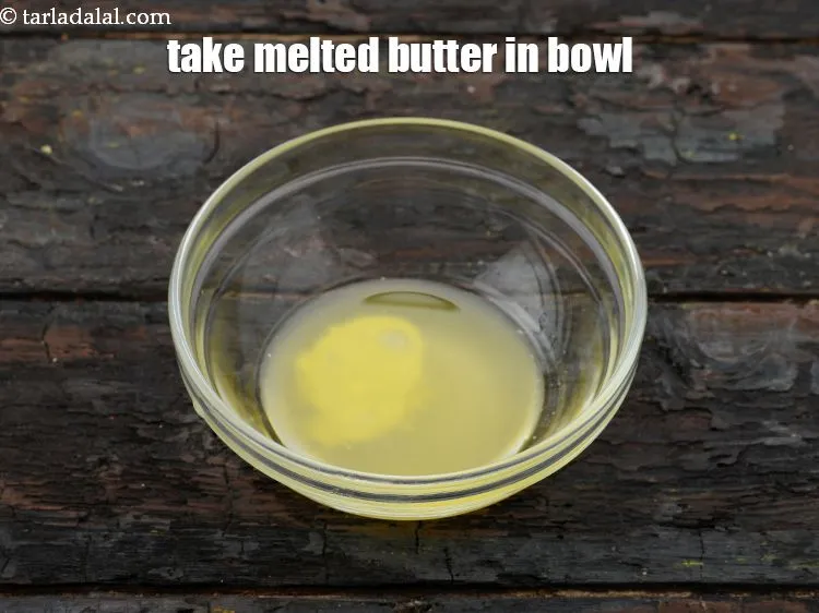 Step 12 – Take 1 tbsp&nbsp;<a href="https://www.tarladalal.com/glossary-melted-butter-1941i">melted butter</a> in a small bowl.&nbsp;