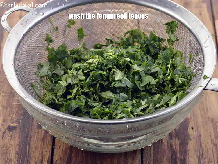 Step 27 – Wash the fenugreek leaves so that the dirt goes away. Keep aside.&nbsp;