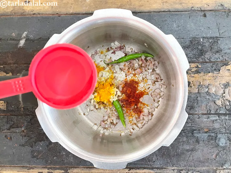 Step 28 – Add&nbsp;1 tbsp of water. This is important as it prevents the masala from burning.