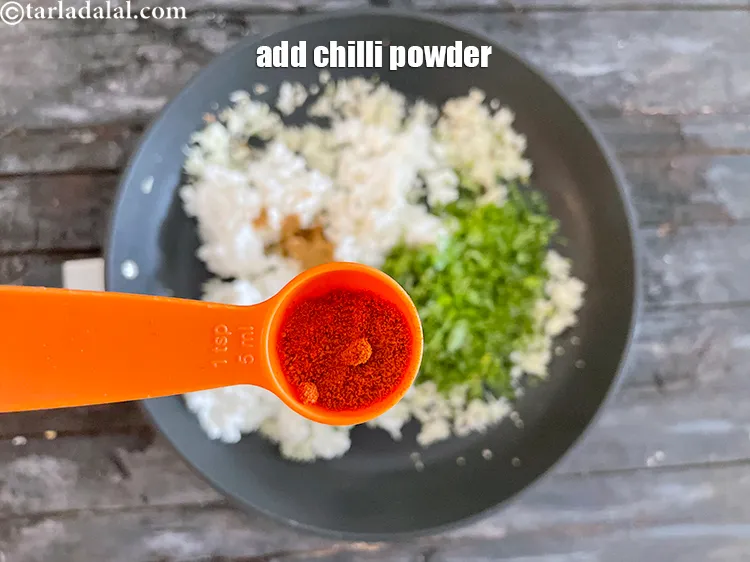 Step 35 – Add&nbsp;1/2 tsp&nbsp;<a href="https://www.tarladalal.com/glossary-chilli-powder-red-chilli-powder-339i" target="_blank">chilli powder</a>.