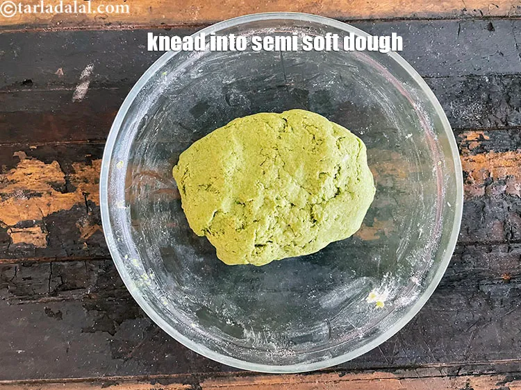 Step 21 – Knead well to make a semi-soft dough.