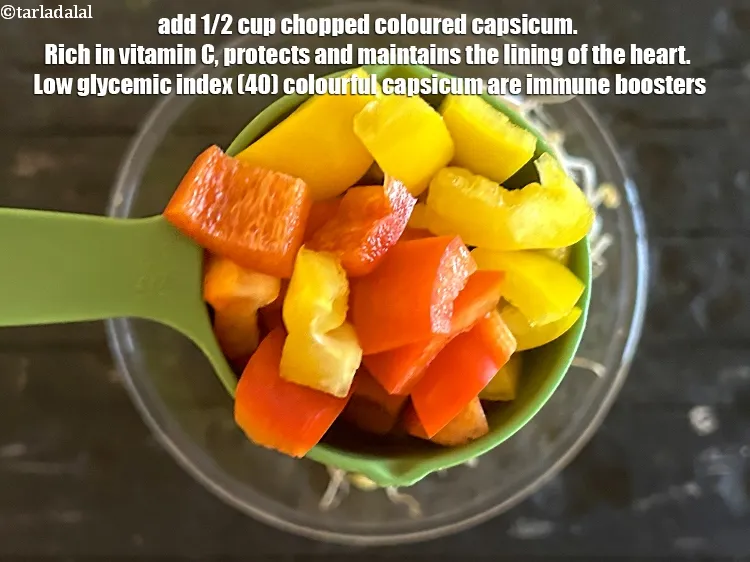 Step 13 – Add 1/2 cup chopped coloured capsicum.&nbsp;Rich in&nbsp;<a href="https://www.tarladalal.com/recipes-for-Vitamin-C-Rich-Indian-Recipes-804">vitamin C</a>,&nbsp;protects and maintains the lining of the …