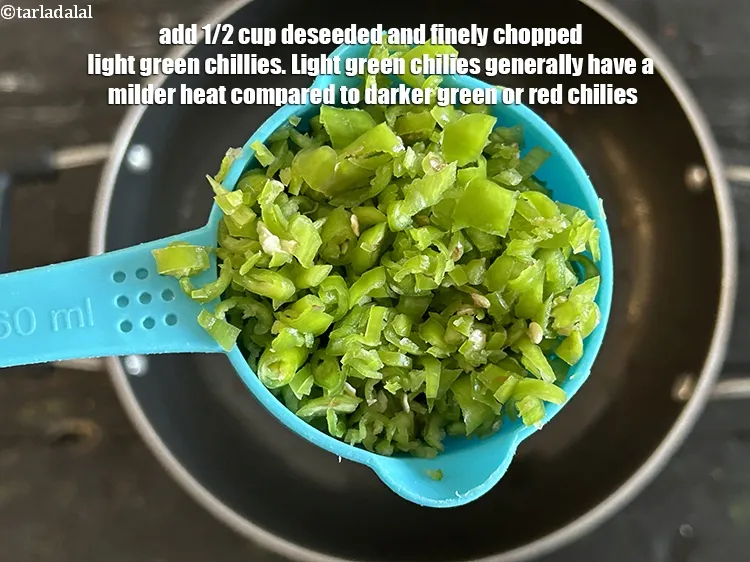 Step 29 – Add&nbsp;1/2 cup&nbsp;deseeded and finely&nbsp;<a href="glossary-chopped-green-chilli-820i">chopped light green chillies</a>.&nbsp;Light green chilies generally have a milder heat …