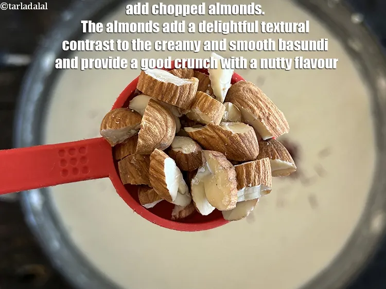 Step 13 – <meta charset="UTF-8" /> Add 2 tsp&nbsp;<strong>chopped almonds (badam).</strong>&nbsp;The chopped almonds add a delightful textural contrast …
