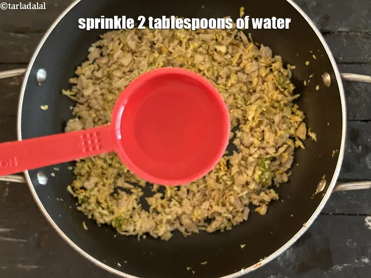 Step 25 – Sprinkle 2 tablespoons of water.