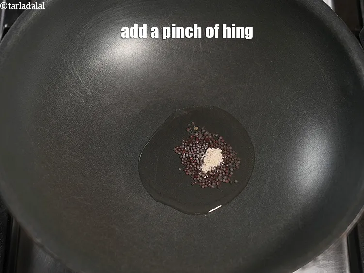 Step 13 – Add a pinch of hing.&nbsp;