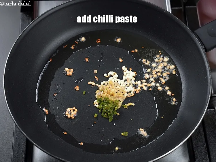 Step 14 – Add &frac12; tsp chilli paste.