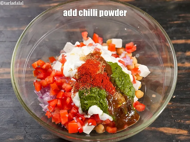 Step 13 – Add &frac12; tsp <a href="https://www.tarladalal.com/glossary-chilli-powder-red-chilli-powder-339i">chilli powder</a>.