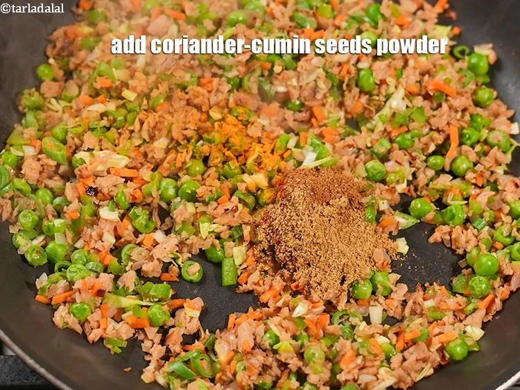 Step 13 – Add 1 tsp <a href="https://www.tarladalal.com/glossary-coriander-cumin-seeds-powder-dhania-jeera-powder-375i">coriander-cumin seeds (dhania-jeera) powder</a>.