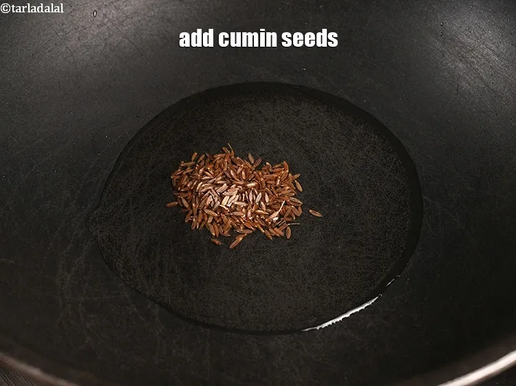 Step 13 – Add &frac12; tsp <a href="https://www.tarladalal.com/glossary-cumin-seeds-jeera-zeera-381i">cumin seeds (jeera)</a>.