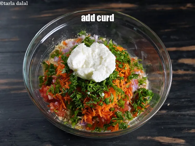 Step 13 – Add 4 tsp&nbsp;<a href="https://www.tarladalal.com/glossary-curd-dahi-yogurt-yoghurt-383i">curd (dahi)</a>.