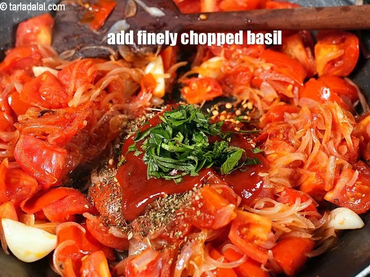 Step 13 – Add &frac12; cup finely&nbsp;<a href="https://www.tarladalal.com/glossary-chopped-basil-804i">chopped basil</a>.