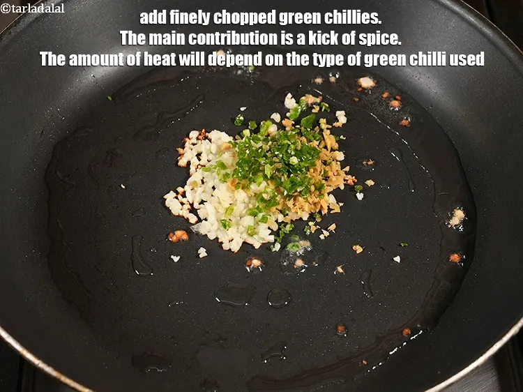 Step 13 – Add 2 tsp finely&nbsp;<a href="https://www.tarladalal.com/glossary-chopped-green-chilli-820i">chopped green chillies</a>. The main contribution is a kick of spice. …
