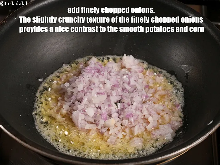 Step 13 – Add &frac12; cup finely <a href="https://www.tarladalal.com/glossary-chopped-onions-722i">chopped onions</a>. The slightly crunchy texture of the finely chopped …