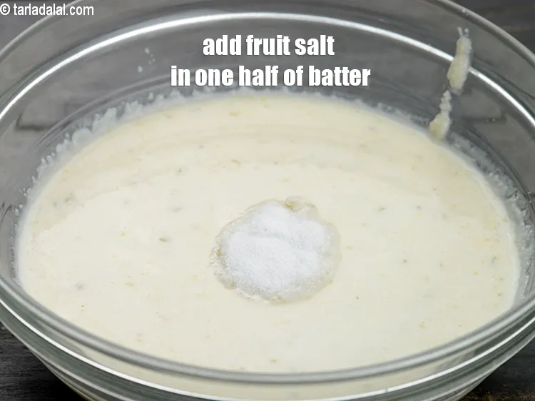 Step 14 – Add &frac12; tsp of <a href="https://www.tarladalal.com/glossary-fruit-salt-420i">fruit salt</a> in one half of the batter.