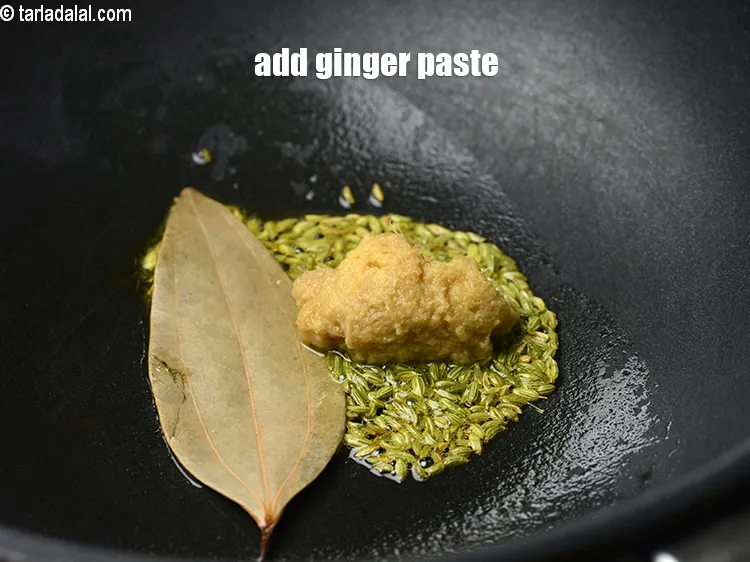 Step 13 – Saut&eacute; on a medium flame for a few seconds.&nbsp;Add 1 &frac12; tsp&nbsp;<a href="https://www.tarladalal.com/glossary-ginger-paste-adrak-ki-paste-457i">ginger (adrak) paste</a>.