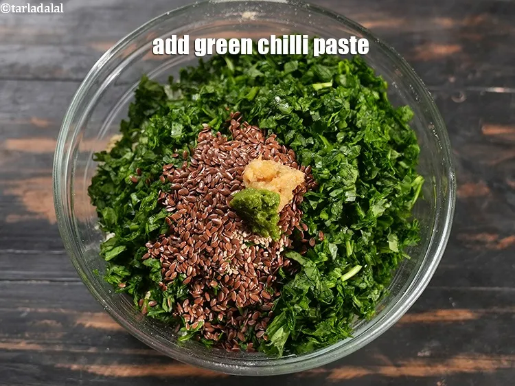 Step 13 – Add &frac12; tsp <a href="https://www.tarladalal.com/glossary-green-chilli-paste-hari-mirch-ki-paste-mirchi-paste-333i">green chilli paste</a>.