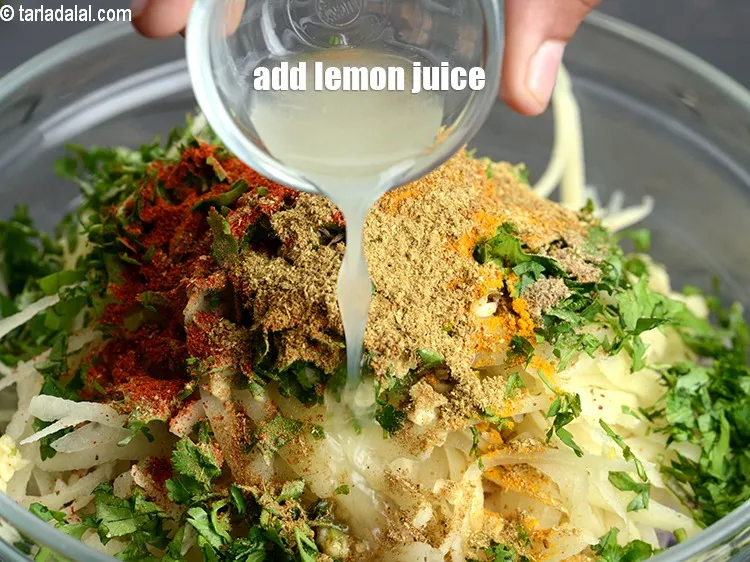 Step 13 – Add 1 tsp <a href="https://www.tarladalal.com/glossary-lemon-juice-numbi-ka-ras-nimbu-ka-juice-471i">lemon juice</a>.