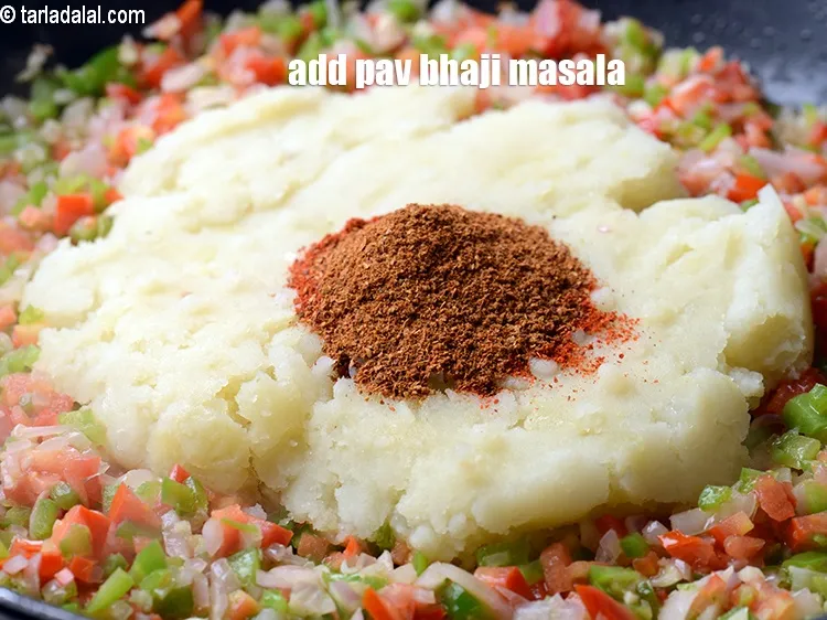 Step 14 – Add 1 tsp <a href="https://www.tarladalal.com/glossary-pav-bhaji-masala-298i">pav bhaji masala</a>.