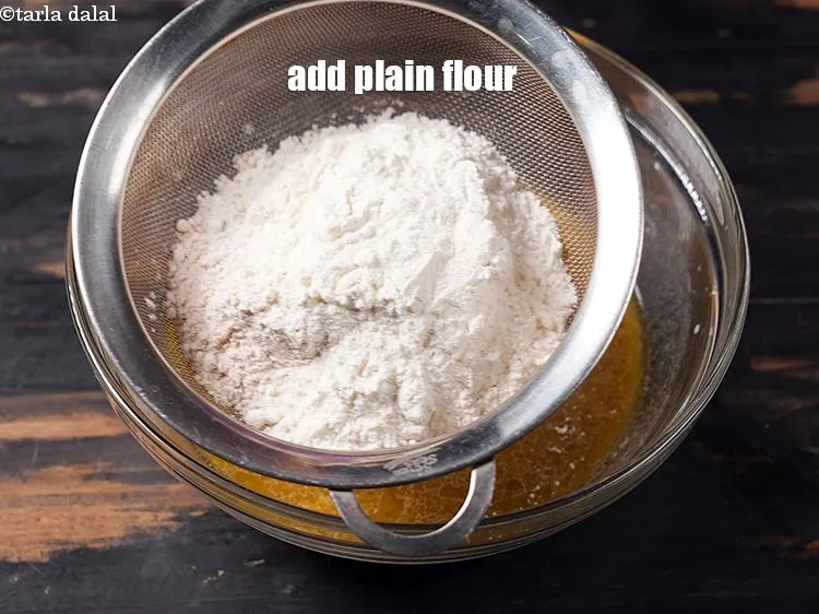 Step 13 – Add 1/3 cup plain flour.
