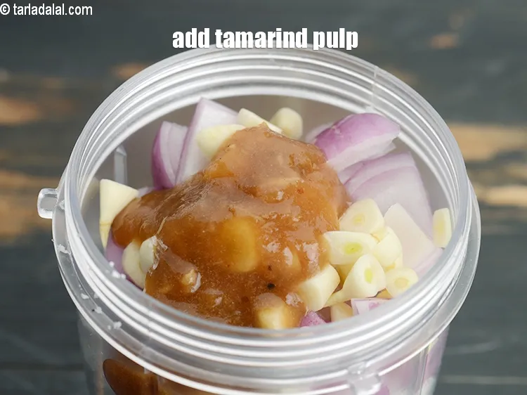 Step 15 – Add &frac12; tbsp <a href="https://www.tarladalal.com/glossary-tamarind-pulp-tamarind-extract-imli-ka-pulp-838i">tamarind (imli) pulp</a>.
