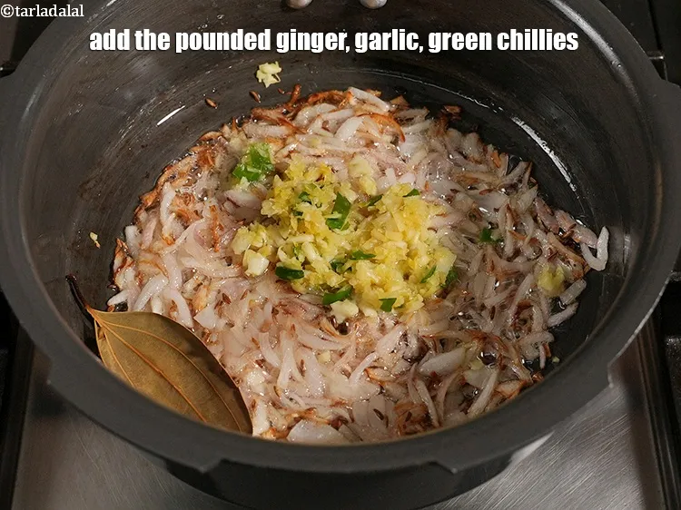 Step 13 – Add the pounded ginger, garlic, green chillies.&nbsp;
