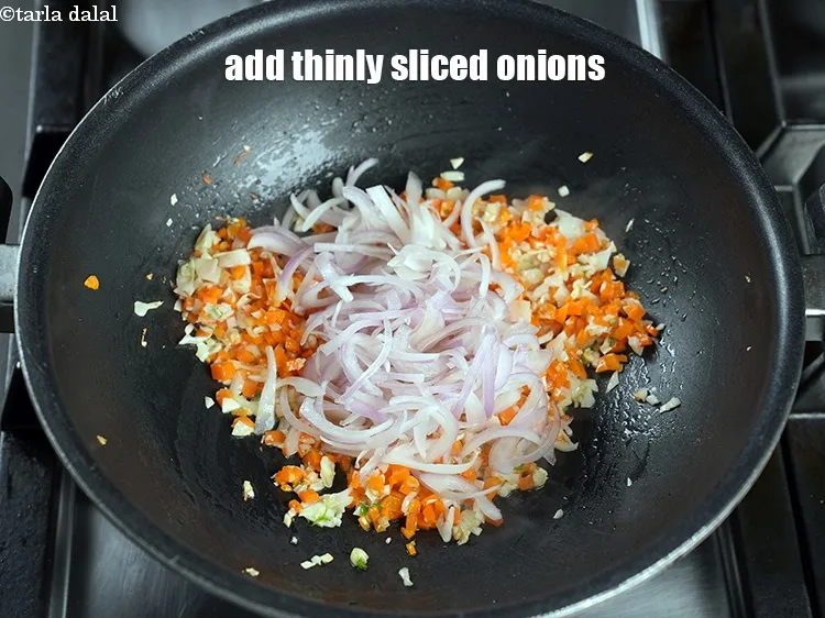 Step 18 – Add &frac34; cup thinly&nbsp;<a href="https://www.tarladalal.com/glossary-sliced-onions-745i">sliced onions</a>