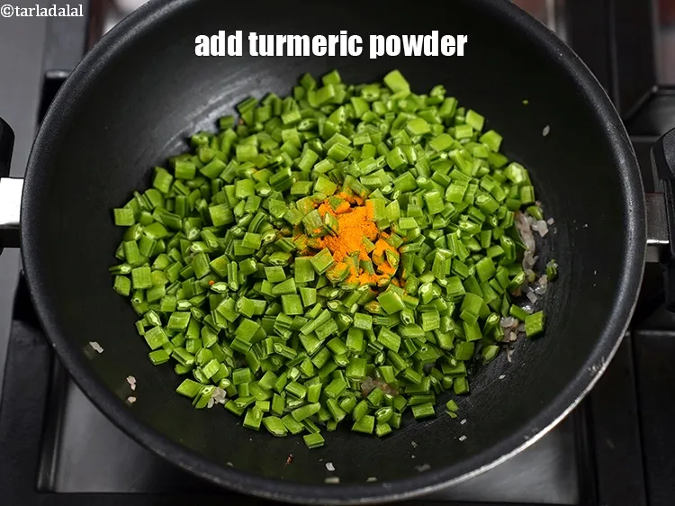 Step 13 – Add &frac14; tsp turmeric powder.