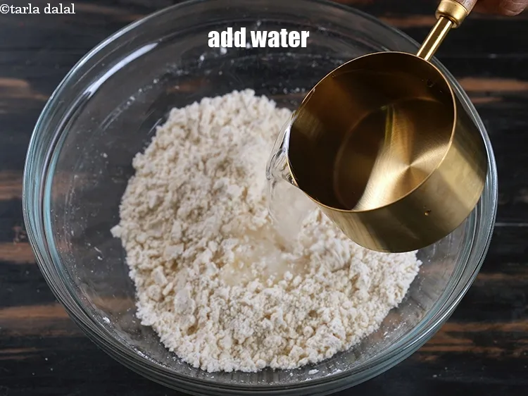 Step 14 – Gradually add &frac34; cup water.