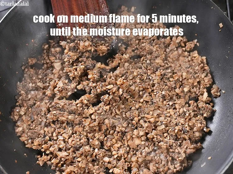 Step 14 – Mix well and cook on medium flame for 5 minutes, until the moisture evaporates, while …
