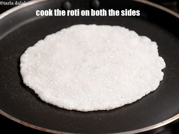 Step 13 – Cook the roti on both the sides for few seconds on medium flame.