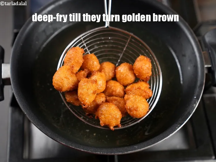 Step 13 – Deep-fry a few at a time on a medium flame, till they turn golden brown …