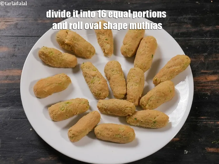 Step 13 – Divide it into 16 equal portions and roll oval shape muthias. Keep aside.