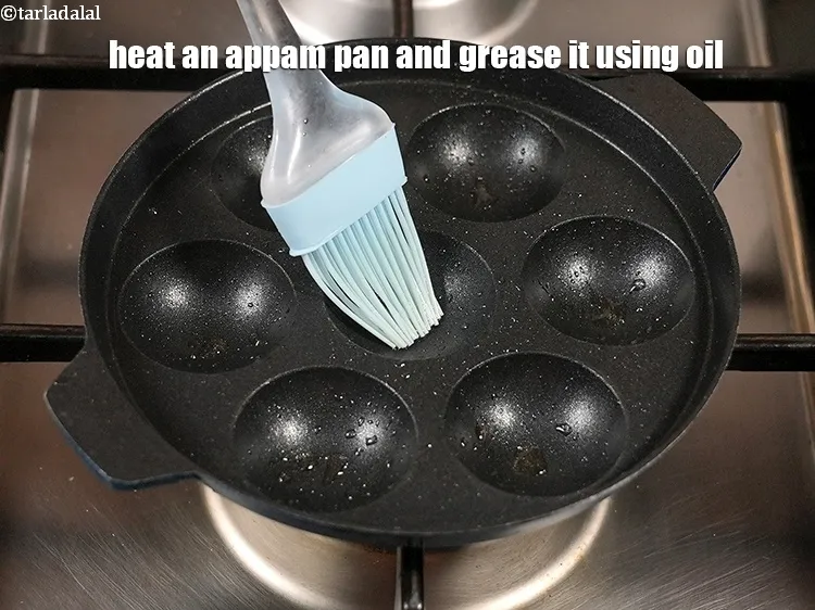 Step 13 – Heat an appam pan and grease it using 1 tsp oil.