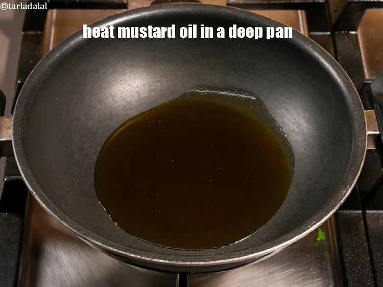 Step 13 – Heat 1/3 cup mustard oil in a deep pan. Mustard oil has a strong, pungent …