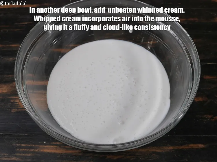 Step 13 – In another deep bowl, add 1 &frac12; cups of <a href="https://www.tarladalal.com/glossary-unbeaten-whipped-cream-whip-cream-973i">unbeaten whipped cream</a>. Whipped cream …