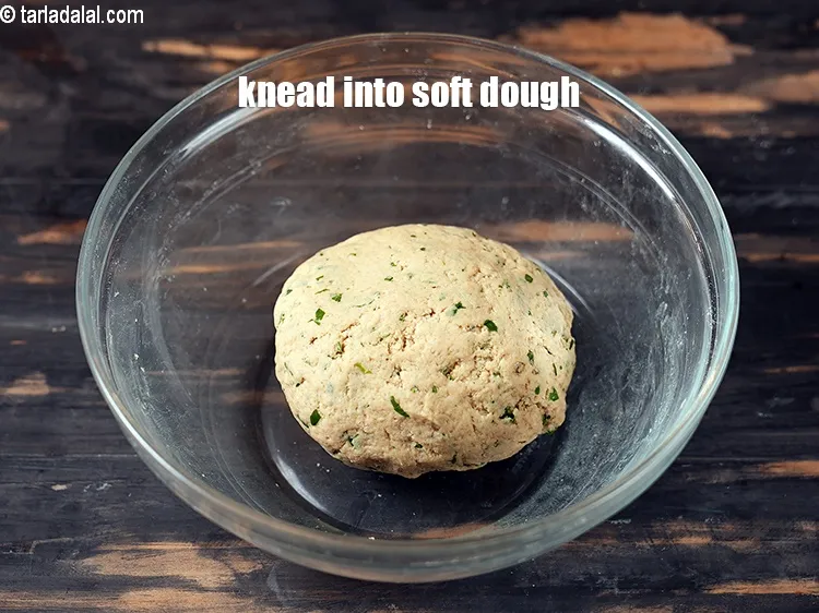स्टेप 13 – लगभग 1/2 कप पानी का उपयोग करके नरम आटा गूंथ …