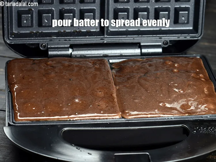 Step 13 – Pour approx. 1/3 cup of the batter to spread it evenly in each mould.&nbsp;