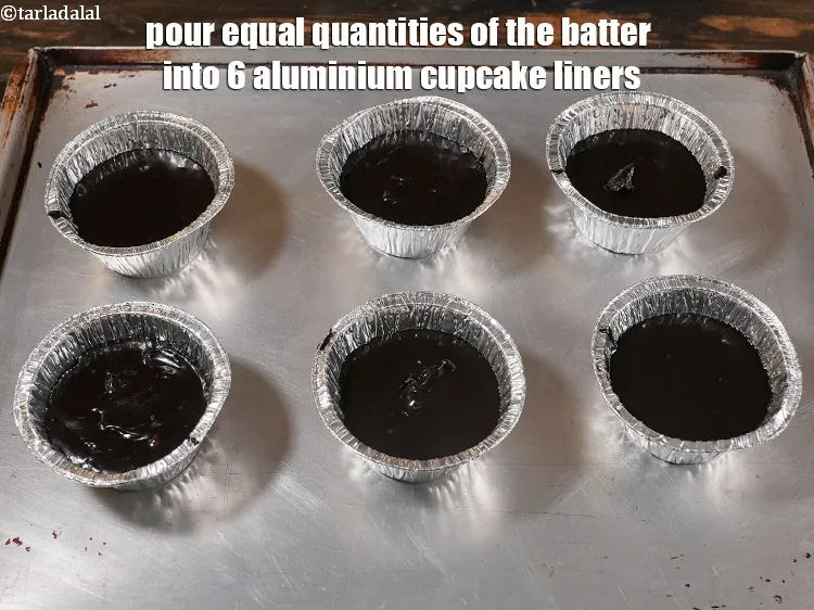 Step 13 – Pour equal quantities of the batter into 6 aluminium cupcake liners.
