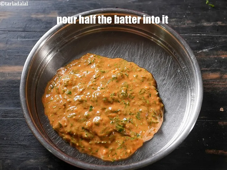 Step 13 – Pour half the batter into it.